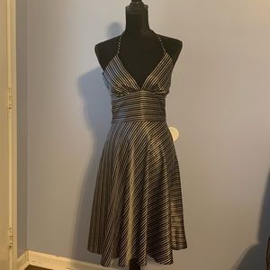 A cute/sexy black and white Alyn Paige dress .